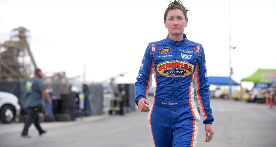 IRWINDALE, CA - MARCH 25:  Julia Landauer, driver of the Lucas Oil/Eibach/Sunrise Ford, walks in the garage during practice for the K&N West Series Napa Twins 100 at Irwindale Speedway on March 25, 2017 in Irwindale, California.  (Photo by Jonathan Moore/Getty Images) *** Local Caption *** Julia Landauer | Getty Images