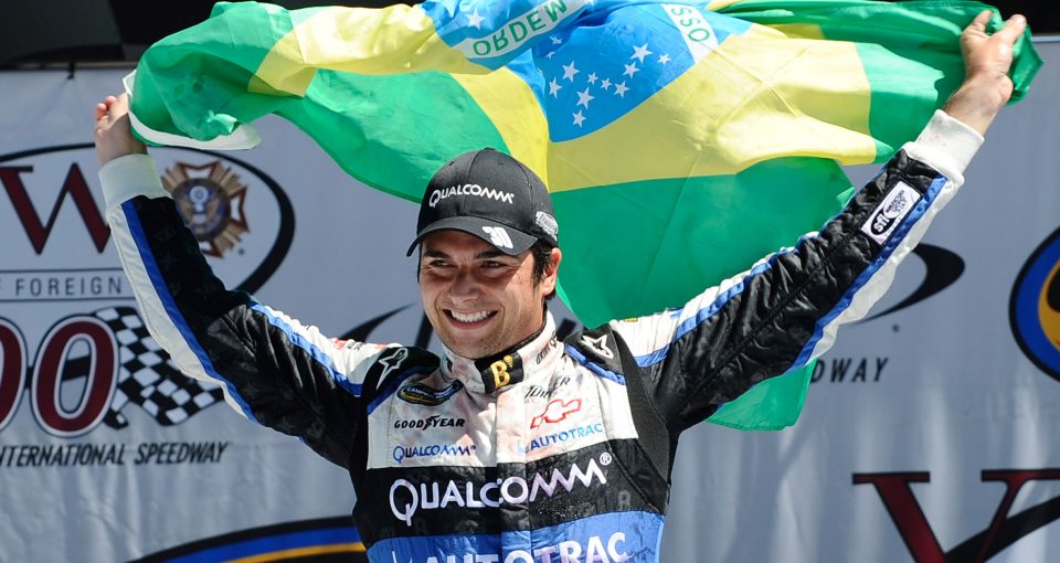 BROOKLYN, MI - AUGUST 18:  Nelson Piquet Jr., driver of the #30 Autotrac Chevrolet, celebrates in Victory Lane after winning the NASCAR Camping World Truck Series VFW 200 at Michigan International Speedway on August 18, 2012 in Brooklyn, Michigan.  (Photo by Jared C. Tilton/Getty Images) | Getty Images